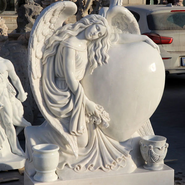 White stone preying baby angel grave markers costs