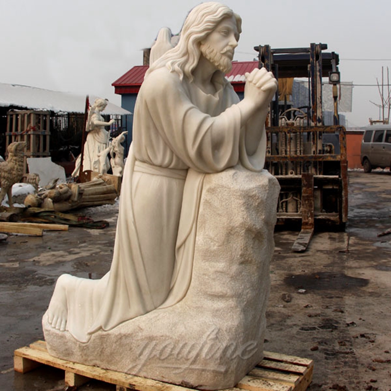 jesus christ statue in white marble